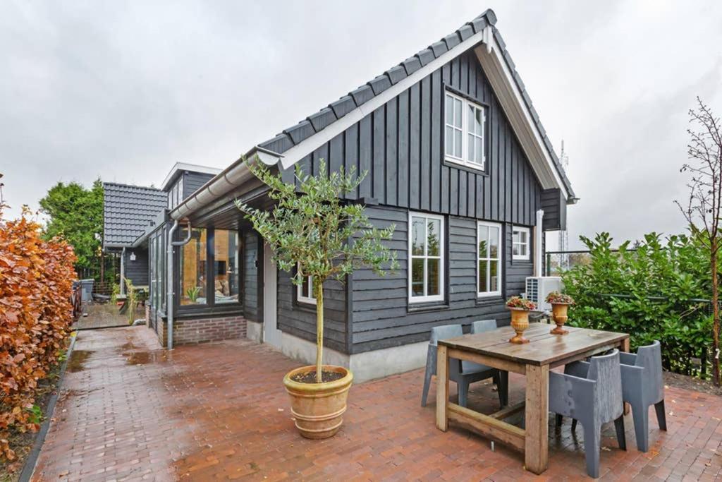 Uniek Houten Huis Nabij Bos En Plassen Hollandsche Rading Bagian luar foto